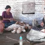 Women cutting coconut.JPG